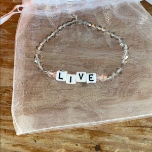 Beaded bracelet “live”
